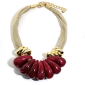 Detail of bohemian water drop necklace with red resin beads and golden woven mesh rope - Red