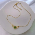 Detailed macro view of square green cat-eye pendant on gold paperclip link necklace - Green Square Stone Pendant Style (DN001)