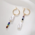 Detailed macro view of asymmetric baroque pearl earrings with colorful crystal beads - Vertical Beaded Style (E040-B)