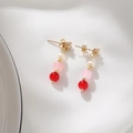 Detail of drop earrings with white pearl, pink bead, and red stone on white silk fabric - Vertical Pink Red Beaded Style (DE045-B)