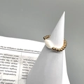 Detail of 18K gold beaded elastic ring featuring a white marquise-shaped shell inlay - Adult / Marquise Shell Style (DR009)