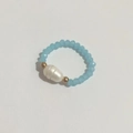 Detailed top view of light blue glass beads ring with white baroque freshwater pearl - Lake Blue Faceted Bead Pearl Style (DR006)