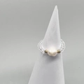 Detail of freshwater pearl ring with golden beads and transparent faceted crystals - Clear