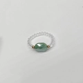 Detail of beaded ring featuring a green marquise stone and golden accent beads - Child-Inner Diameter 13-14mm / Green-Gold