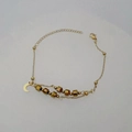 Detail of gold layered star moon bracelet with textured cube beads and lobster clasp - Gold Double Layer Moon Style (DB042-Moon)