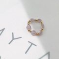 Detail of beaded ring with pink heart crystals and gold beads on white paper - Inner Diameter 17-18mm / Gold/Pink Heart Cat's Eye