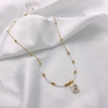 Golden chain necklace with white crystal beads and zircon rectangle pendant - White