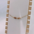 Minimalist gold chain necklace with natural turquoise stone cylinders and gold spacer beads - Gold Tiger Eye