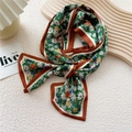 Daisy print silk neck scarf with yellow flowers on green background and orange edges - Green Chicory Floral