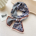 Narrow silk scarf in grey-blue with orange floral patterns and red-brown borders - Blue Reed Print