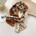 Narrow silk scarf for women featuring floral prints and daisy patterns in caramel and beige - Caramel White Daisy
