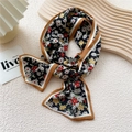 Daisy floral long silk scarf in black with caramel trim and elegant petal print - Black Chicory Floral