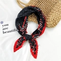 Pleated silk scarf with black and red polka dots and stripes, displayed on white fabric - Architecture Dots Red