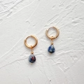 Detail of 18k gold drop earrings with natural teardrop stones on stone background - Natural White Blue Spot Teardrop-Gold