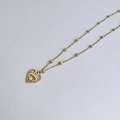 Detail of 18K gold-plated stainless steel bead chain with hollow heart and evil eye pendant - Style 172 Heart Satellite Chain