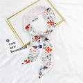 Elegant white twilly scarf with orange floral prints on a gold decorative tray - 13D Line Water Stain Flower