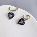 Detail of heart-shaped glass earrings with hand-painted pink rose pattern and gold hoops - Black Heart-Gold