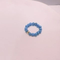Elastic beaded ring featuring turquoise-style blue stones and a single gold metal accent - Blue Turquoise - Gold Color