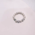 Elastic beaded ring featuring white turquoise stones and faceted silver accent bead - White Turquoise - Steel Color