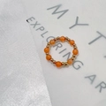 Beaded stretch ring featuring alternating orange translucent stones and gold steel beads - Inner Diameter 17-18mm / Gold/Orange Cat's Eye