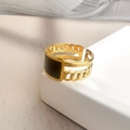 Macro view of gold-plated chain-link ring with a rectangular black enamel inlay design - Adjustable Open / Gold Square Chain Style