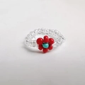 Handmade elastic beaded ring featuring a red flower charm and turquoise center - 1 Flower - Red