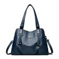 Dark blue litchi pattern leather tote bag with kangaroo metal logo and tassel details - Blue