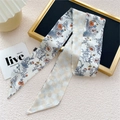 Floral and checkered silk twilly scarf hair tie shown on a premium display stand - 6.5*125cm / 12L Poppy