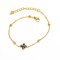 Elegant gold-plated titanium steel bracelet with black clover pendant and bead accents - Gold Black Zirconia