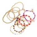 Detail view of colorful beaded starfish anklet set with bohemian charms on white background - 9 Piece Bohemian Starfish Style (L-056)