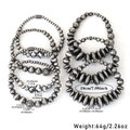 Close-up of 7-piece bohemian beaded bracelet set with detailed silver oxidized metal charms - Gun Black (S-272 [Set of 7])