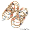 Detalle de cuentas coloridas y bolas doradas CCB en un set de pulseras elásticas de 18cm - Juego de 16 piezas (S-273)