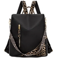 Mochila de mujer en tela oxford negra con detalles de leopardo y diseño antirrobo - Leopardo Amarillo Negro