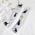 Detail of white ice silk sun sleeves with bohemian black cat and gold sun patterns - One Size / Lunar Eclipse Style