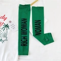 Detail of neon green cooling sun sleeves with thumb holes and RICH WOMAN text print - Green