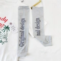 Detail of light gray cooling ice silk arm sleeves with thumb holes and slogan print - Gray