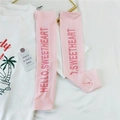 Detail of pink cooling ice silk sleeves with Hello Sweetheart text and thumb hole design - Pink