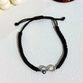 Pulsera infinito tejida a mano negra con ojo turco azul y cristales brillantes de mujer - Negro