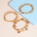 Vue détaillée de bracelets multicouches en perles faits main avec breloques papillon - Ensemble de 3 - Pendentif Papillon Ambre Blanc Café (22082)