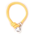 Detail of yellow woven necklace featuring a large pearl and marble textured beads - Bright Yellow