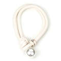 Detail of minimalist oversized pearl pendant on thick beige woven cord sweater necklace - Off White