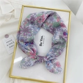 Floral cotton linen scarf in pastel purple and pink tones with delicate knot detail - Hualien Purple