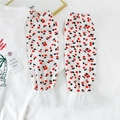 Detail of white summer sun sleeves with red cherry print and delicate lace cuffs - Chiffon Lace Cherry Red