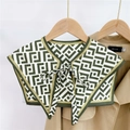 Detail of green geometric pattern faux collar shawl with tie bow on a khaki coat - Double L Dot Green (5F)
