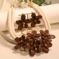 Bohemian acrylic flower necklace and earrings set with woven rope on a display stand - Brown Flower Necklace and Earrings Set (X-770)