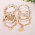 Bohemian multilayer beaded bracelet set with gold butterfly, starfish charms and tassel - 10-Piece Bohemian Style (S-596)