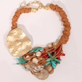 Detailed view of bohemian starfish shell necklace with turquoise charms and woven cord - X-955 Necklace