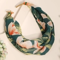 Detail of bohemian floral print fabric necklace with metal beads and wooden buckle accents - Dark Green Floral Fabric Scarf With Wood Buckle (X-909)