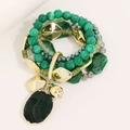 Set bracciali multistrato con perline verdi, dettagli dorati e ciondoli in pietra nera - Verde Scuro (S-445)