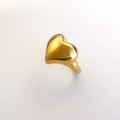 Macro detail of high-polished 18K gold heart-shaped minimalist ring on white background - Adjustable Open / Gold 3D Heart (DR062)